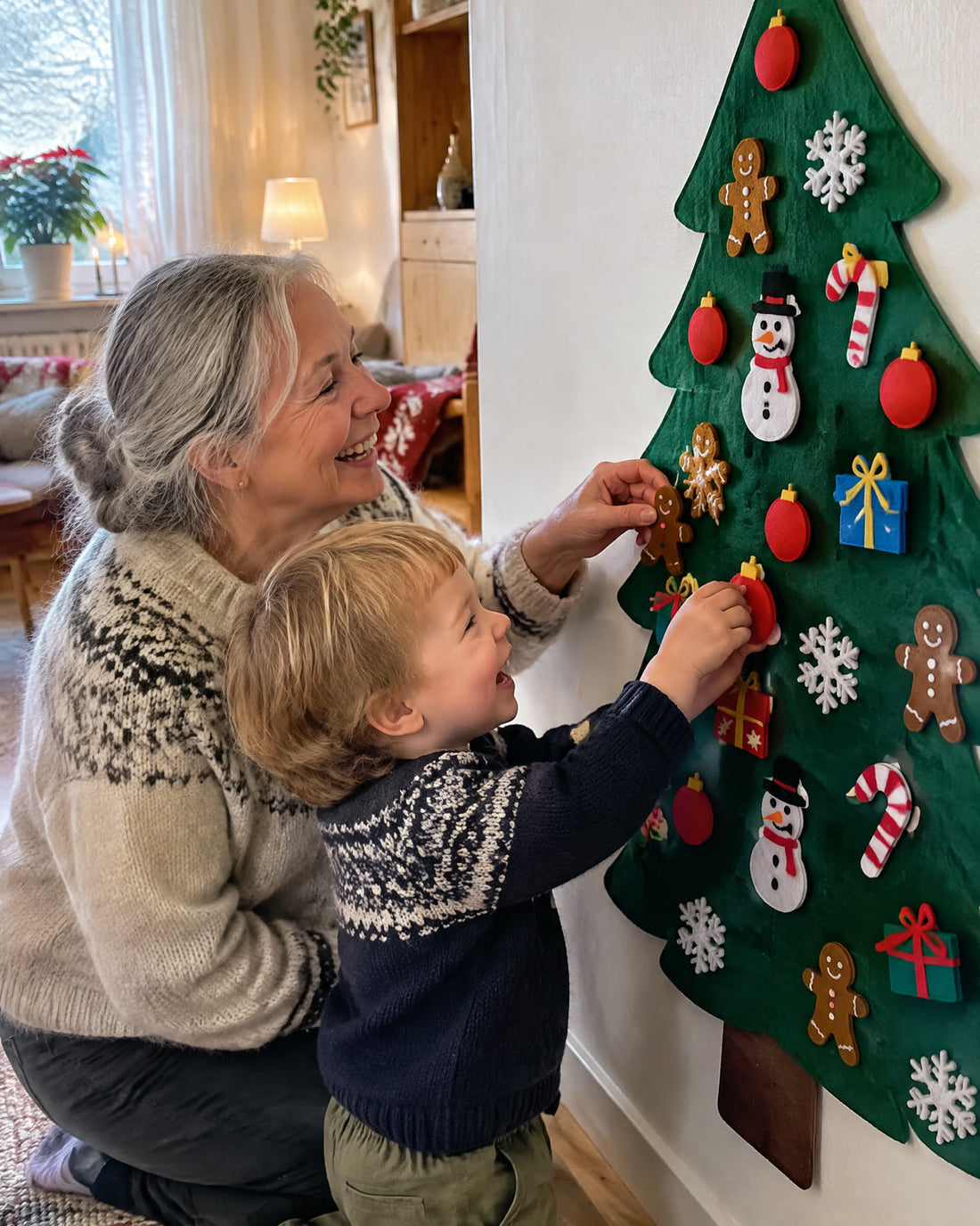 Mormor och barnbarn klär filtgranen